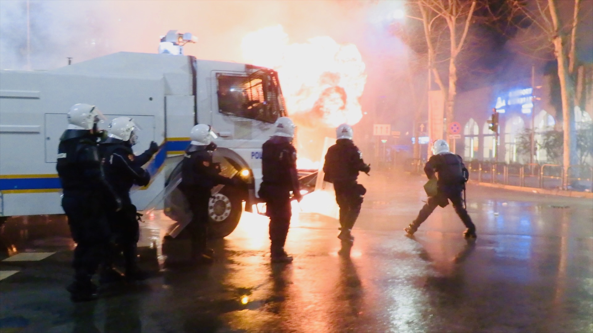 Anti-government protesters throw explosives at riot police in Tirana